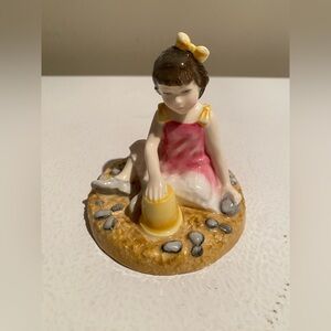 Royal Doulton Figurine of Girl with Sandcastle ON THE BEACH